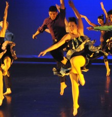 Dancers smiling and jumping