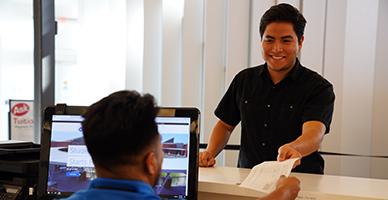 Student at service counter