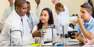 Students and instructor at a science lab station