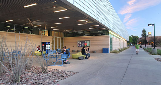 The patio of an academic building a dusk