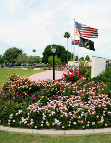 Rose beds and flags in the rose garden