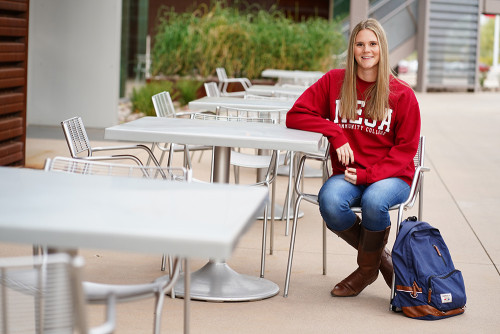 Student sitting outside