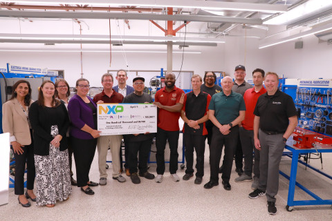 Left to right: Nilam Patel &amp; Karley Mellberg (MCCF); Becky Baranowski (EMCC), Nicole Steverson, Scott Hibben &amp; Geno Fallico (NXP); NXP scholars Hao Yang &amp; Khalil Ross; Brian Kohlenberg (MCC); NXP Scholar Eric Snelling; Ken Hackler (MCC); NXP scholar Harry McCool; Matt Rayman and Michael Voss (MCC). 